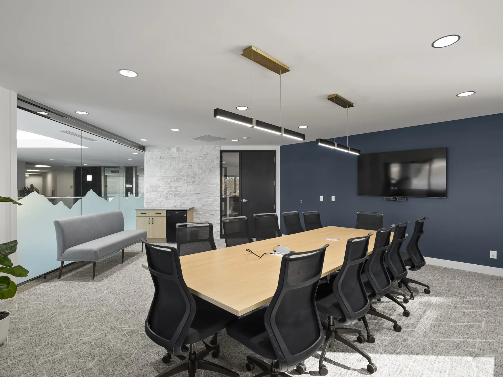 Completed office interior with contemporary blue accent wall